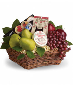 Delicious gift basket of fruits and cheese