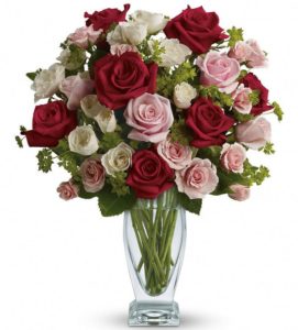 Couture Vase filled with stunning pink and red roses - the iconic flower of love.