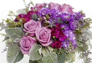 Our modern Lilac and Lavender cube is filled with a mix of lilac and lavender colored roses and an assortment of lavender and purple hues.